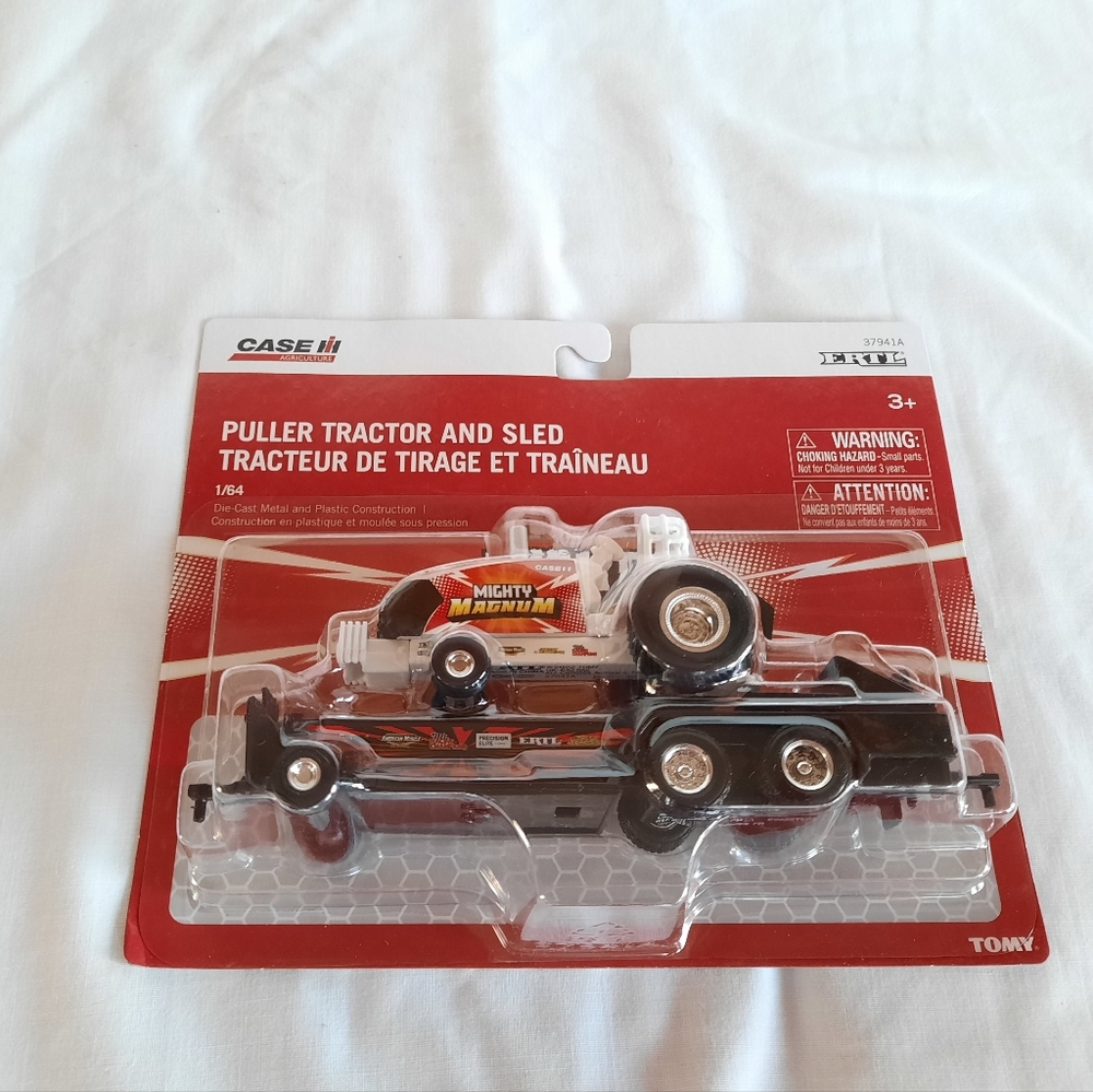 1/64 case ih pulling tractor and sled